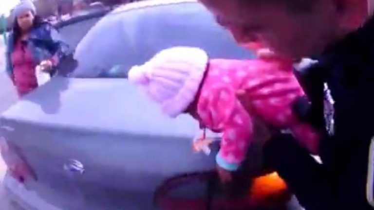Watch As Police Officers Save Choking Baby In Middle Of Busy Intersection