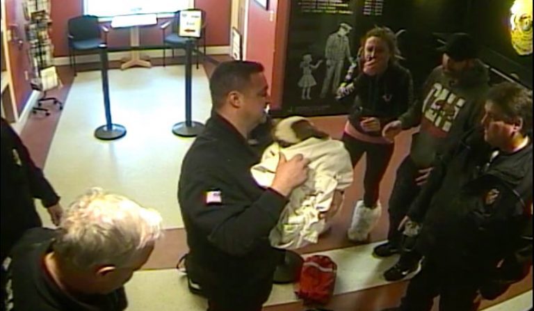 cops save choking puppy