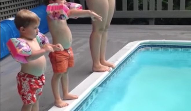 Child Performs Spectacular Belly Flop Into Pool And Makes The Whole Family Laugh