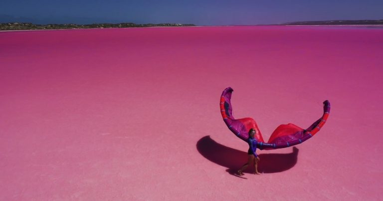 Woman Kitesurfing Across Spectacular Pink Lagoon Has To Be Seen To Be Believed
