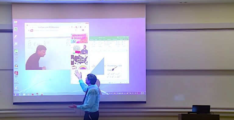 Math Professor Tries Cleaning Dirty Projector Screen In Delightful April Fool’s Day Prank