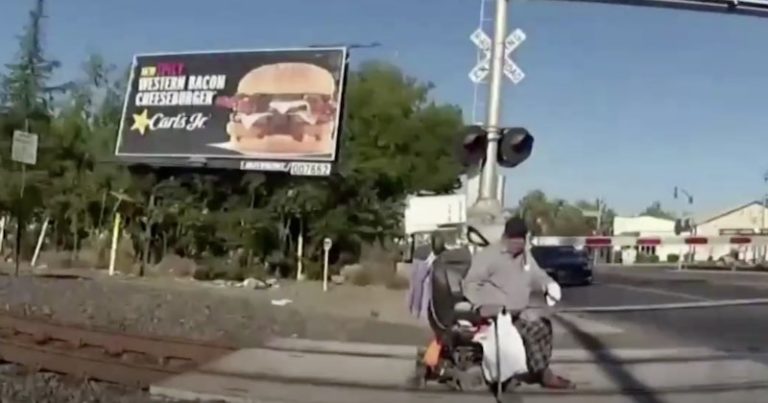 Cop Saves Wheelchair-bound Man From Oncoming Train With Just Seconds To Spare