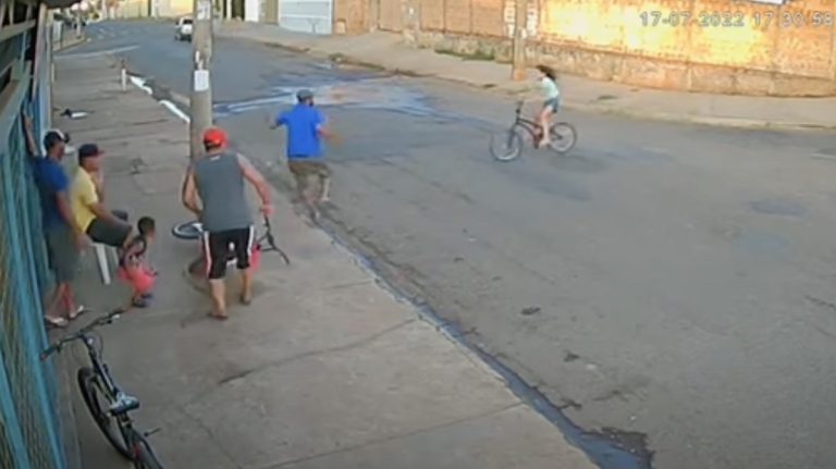man saves girl on bike from accident