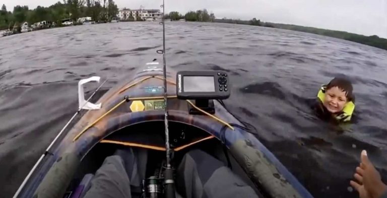 David Jones in kayak saves boy from drowning