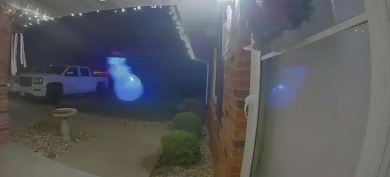 Snowman blown in wind